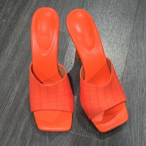 Gabrielle Union Chic Orange Croc-Embossed Mules